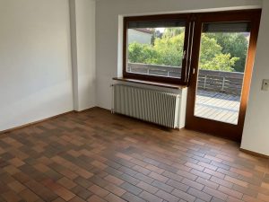 Wohnzimmer mit Zugang Terrasse OG